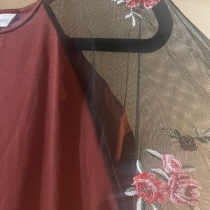 Randy with mesh sleeves and flowers